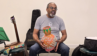 Lenny Marsh leads a Music, Movement, and Community Class